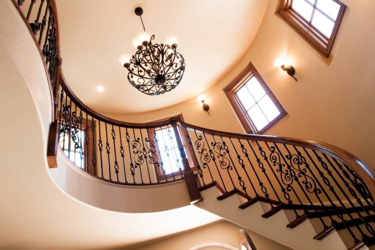 Grand curving staircase in a home.